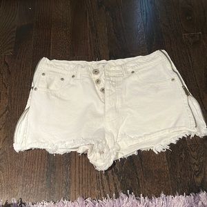white jean shorts with zippers